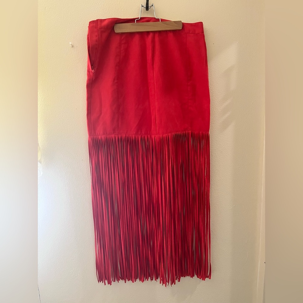 Red fringe skirt, size 10 fits like an 8. Worn twice